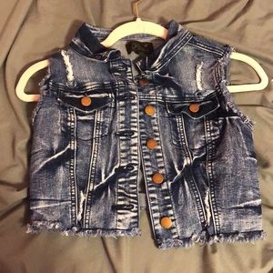 Ripped jean vest